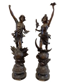 Le Matin and Le Soir Statues