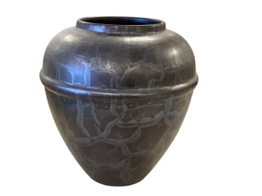 Iridized Pottery Vase . Approximately 9" tall. Opening is 4.5".