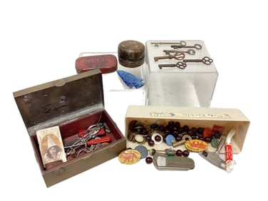 Containers of Advertisement Pins, Buttons, and Keys