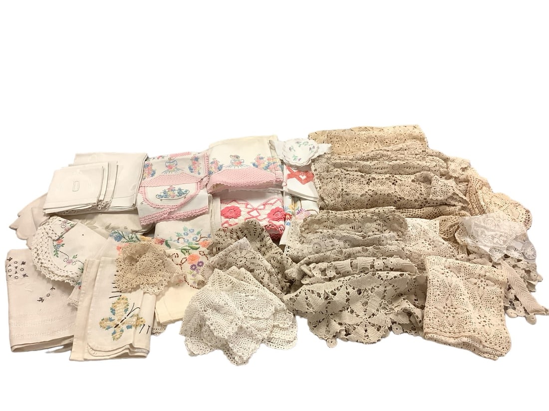 Assortment of Doilies and Linens (50+) Items: Assortment of Doilies and Linens (50+) ItemsMonogrammed napkins and tea towel, boarded pillowcases, and more.