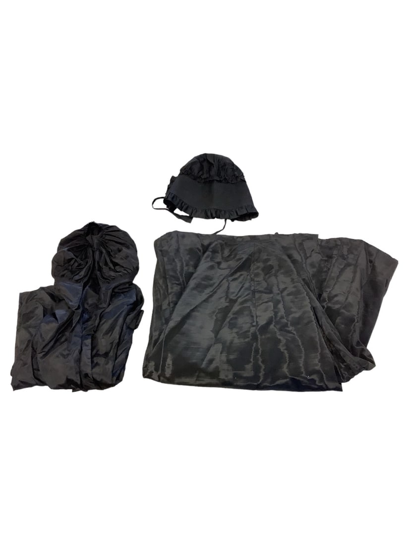 Black Amish Style Clothing: Black Amish Style Clothing Bonnet, skirt and shirt. Skirt is heavy material. Waist is approx 13" across with eye hooks for adjusting. Length is approx 39"-42" with straight pins for adjusting. Blouse 