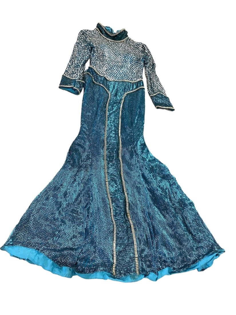 50's Costume Style Dress Length is approximately 63".: 50's Costume Style Dress This exquisite statement dress is a show stopper! Every inch of this silk dress is detailed with sparkling embellishments. The fitted dress ends with a flare. Please note, the