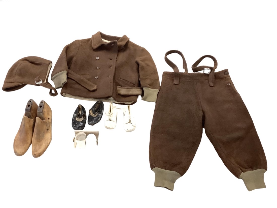 Vintage child outfit, baby shoes and wooden shoe molds: Vintage child outfit, baby shoes and wooden shoe molds Thick dark brown wool outfit: approx 21" from waist to cuff and approx 13" from shoulder to cuff 4x Infant shoes Wooden shoe molds approx 10" lon