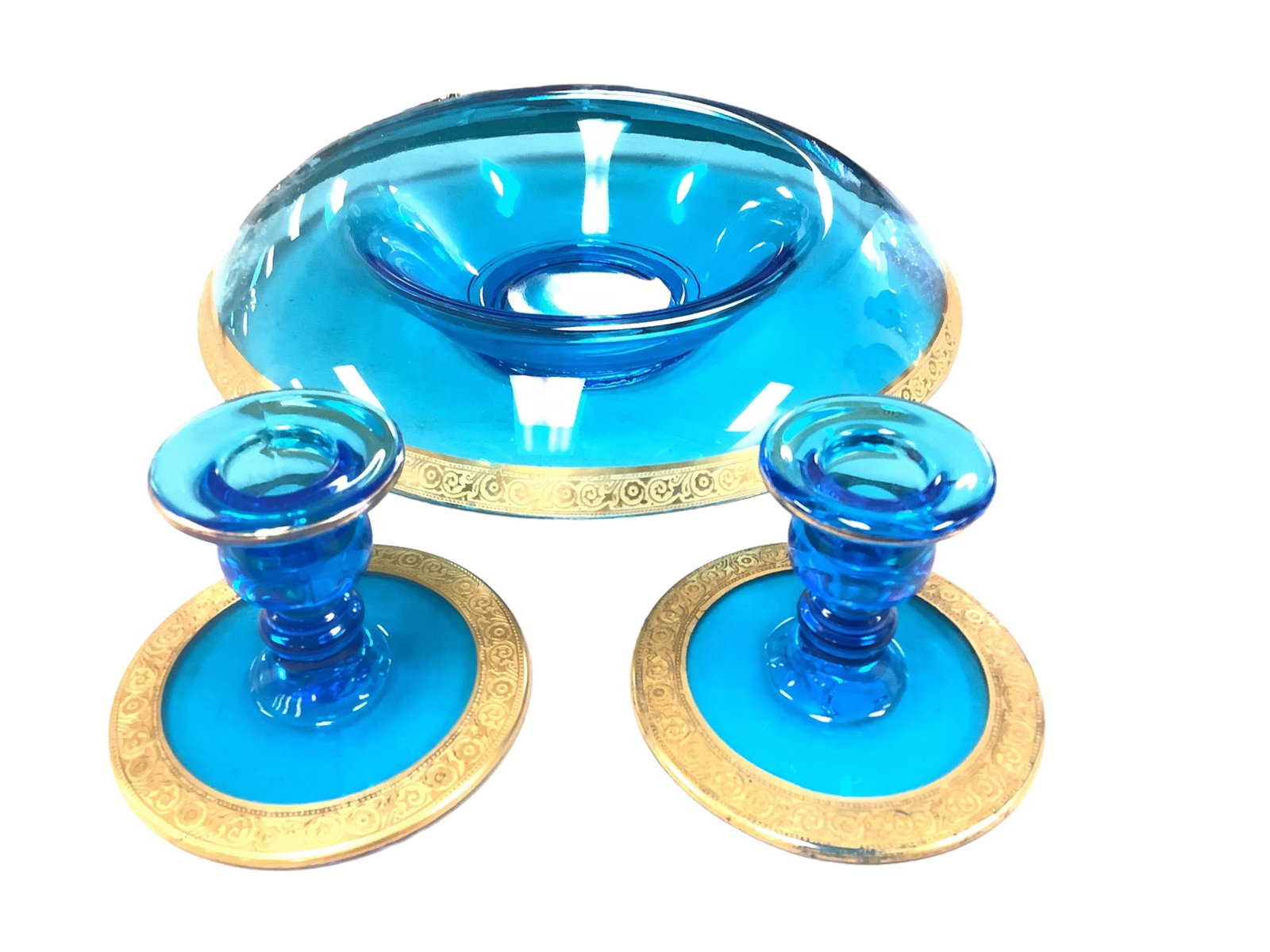 Electric Blue Candle Holders and Bowl Candle holders are 3.25" x 4.25"; bowl is 2.5" x 11": Electric Blue Candle Holders and Bowl 2 glass candle holders and 1 matching glass bowl. Candle holders are 3.25" x 4.25"; bowl is 2.5" x 11"