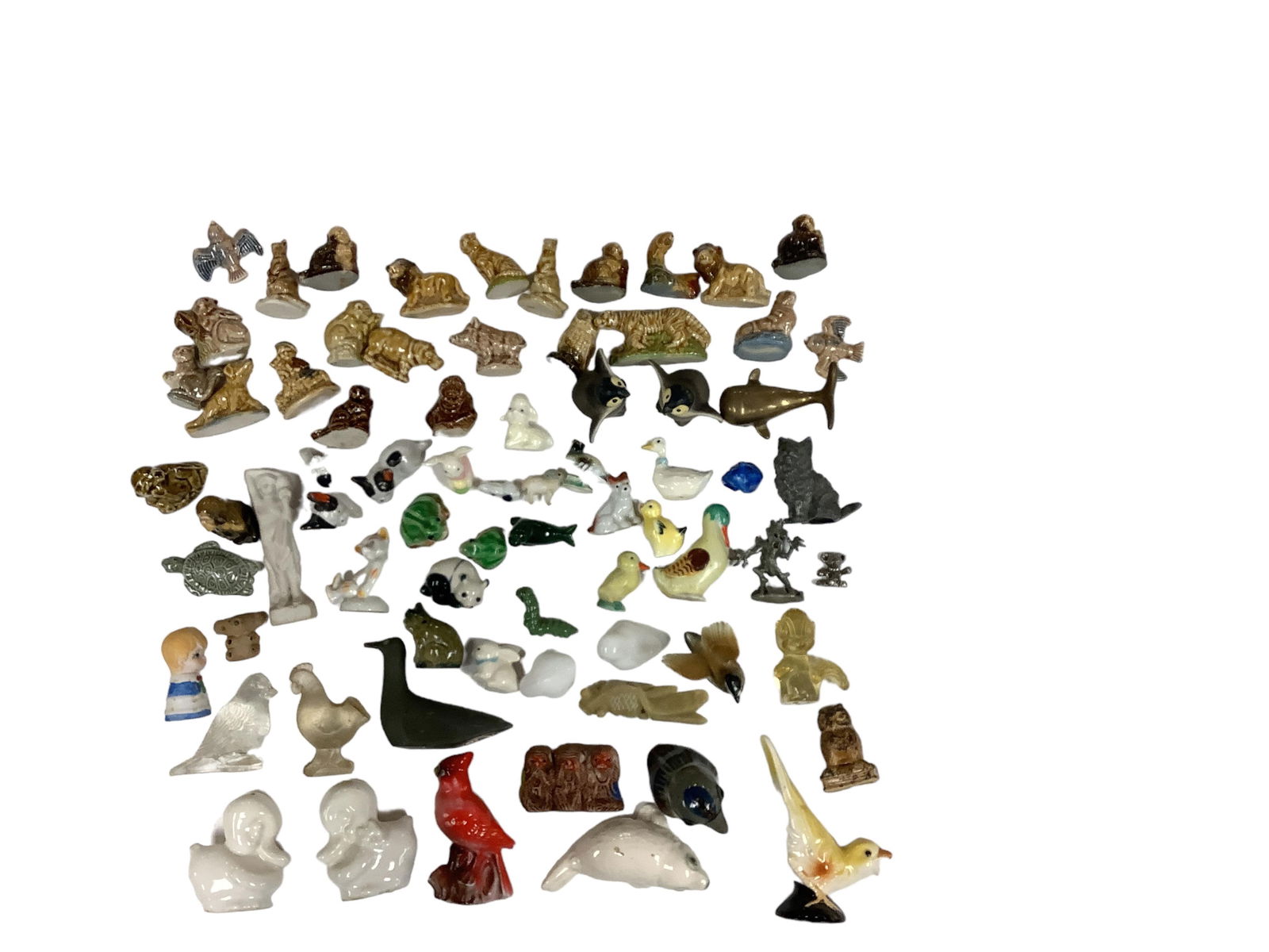 Miniature Glass Figurines: Miniature Glass FigurinesIncludes 26 Wade glazed ceramic animals; 4 metal pieces, and approximately 45 ceramic figurines.