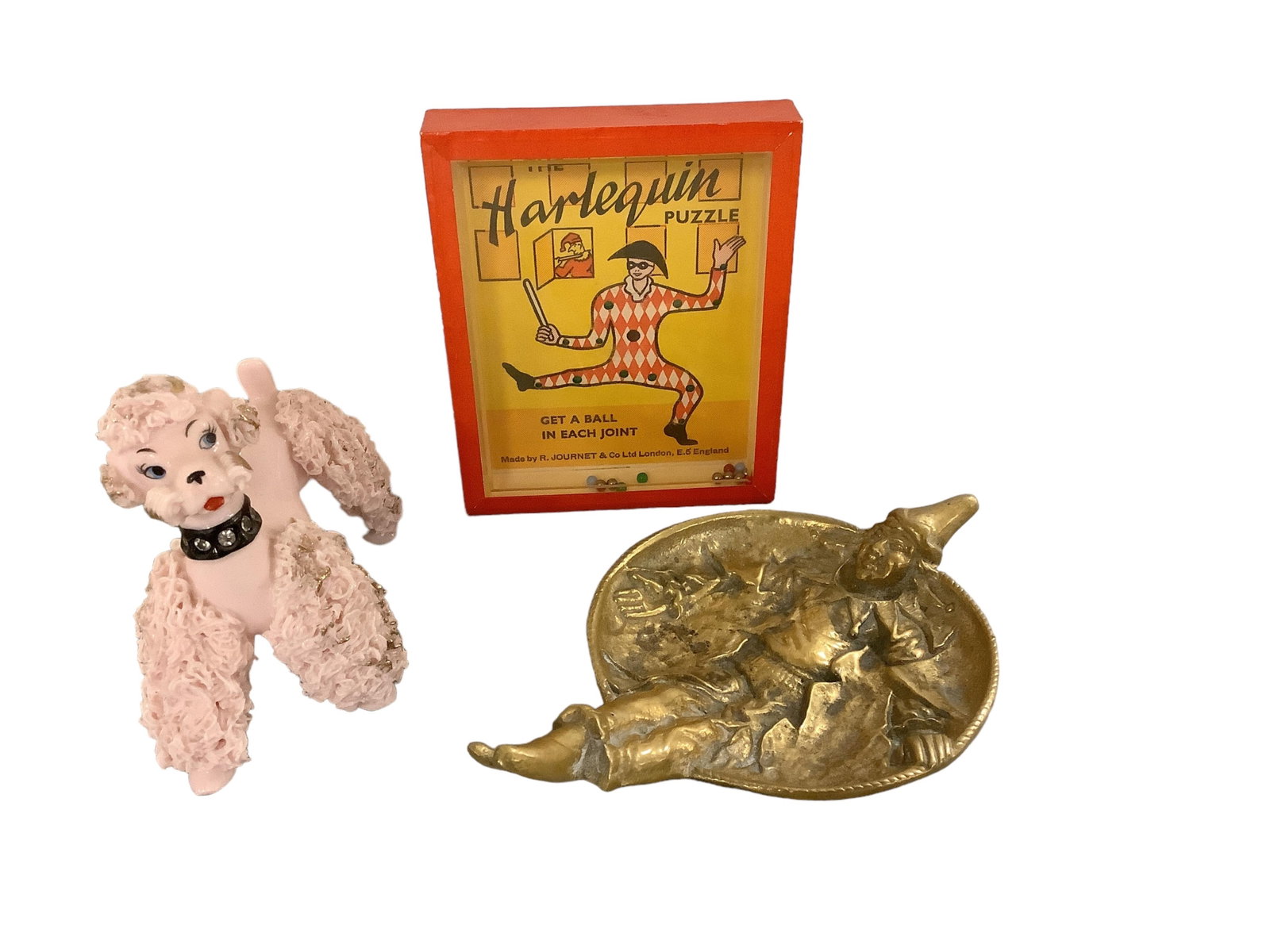 Vintage Lefton Spaghetti Poodle and More: Vintage Lefton Spaghetti Poodle and More Includes a metal jester trinket dish, 7"L, a Harlequin Popular Puzzle, and an adorable pink Lefton poodle with black collar with rhinestones.