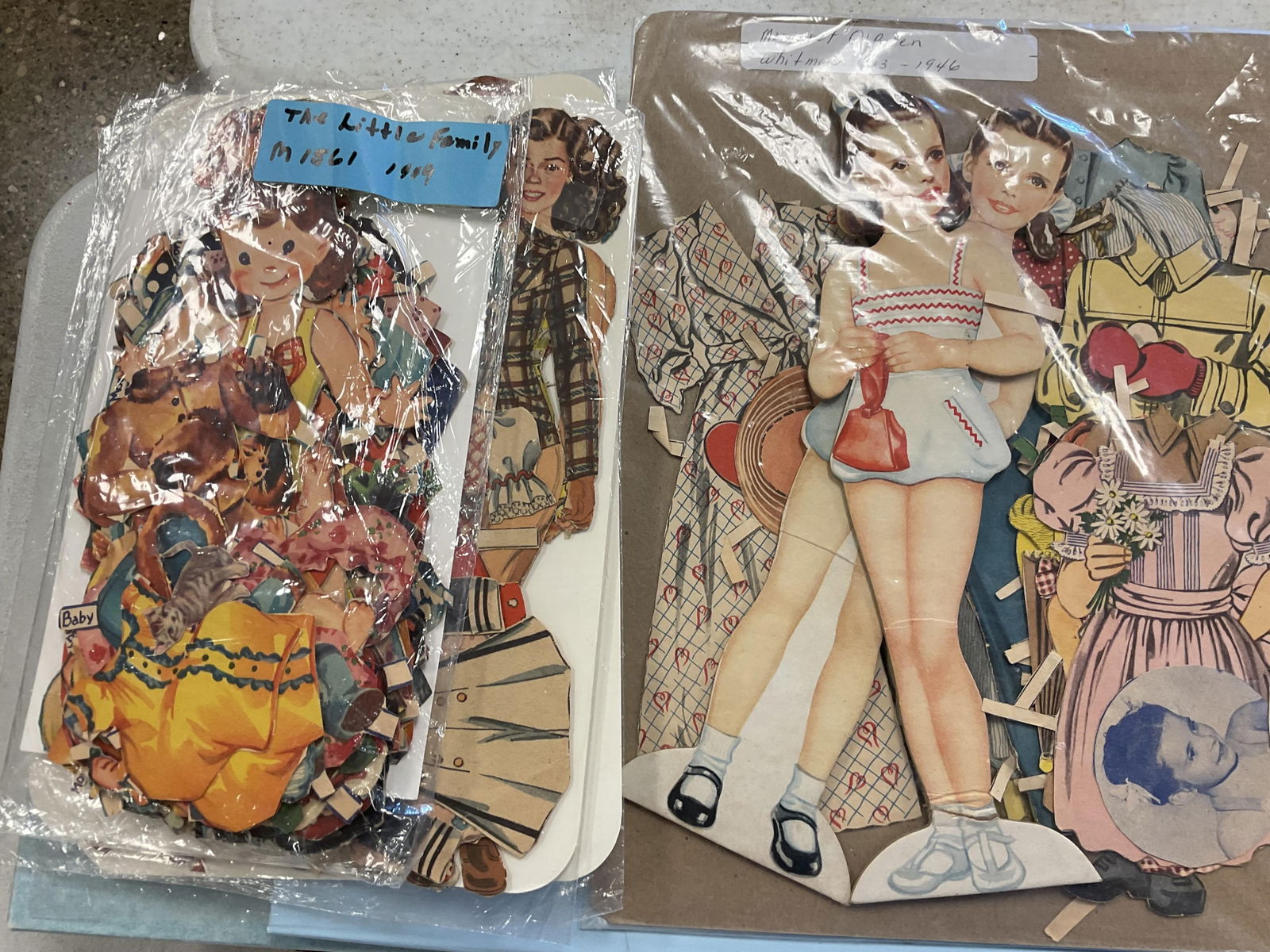 Paper doll collection highlighting Whitman. (1 of 5)