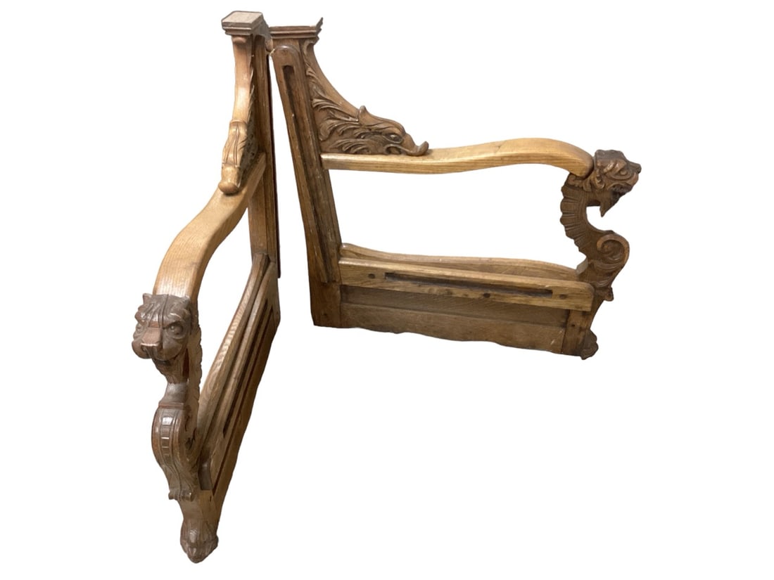 Turn of the Century Oak Bench Arms with Carved Lion & Bird Heads 33 1/2" H x 2 1/2" W x 33" L. The: Turn of the Century Oak Bench Arms with Carved Lion & Bird Heads33 1/2" H x 2 1/2" W x 33" L. The slot for the back is 1" W x 23 1/2" L. The slot for the seat is 1" W x 17" L.