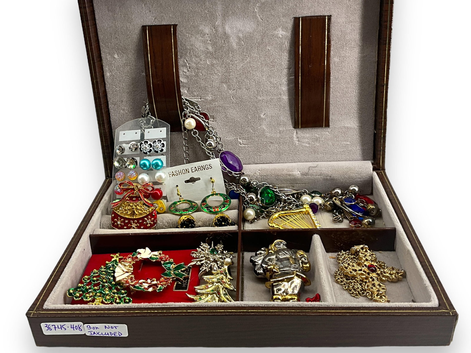 Colorful Lot of Christmas Jewelry and More: Colorful Lot of Christmas Jewelry and More Lot has colorful Christmas pins in gold and silver-tone metal, a pair of holiday enamel and bead pierced earrings in gold-tone metal, a gold-tone cross neckl