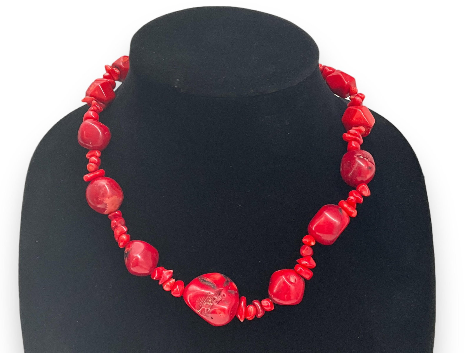 Coral Necklace: Coral Necklace Choker length (16") with tumbled and faceted coral beads the largest measures at (24.3mm) spring ring clasp closure.