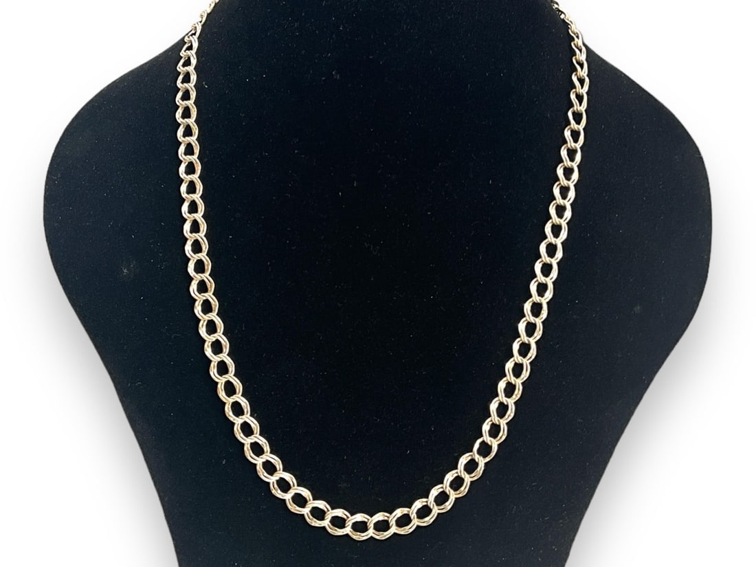 Sterling Silver Necklace: Sterling Silver Necklace Measuring (20") in length with double circular links, stamped and tested with a spring ring clasp closure (0.42 troy oz tw).