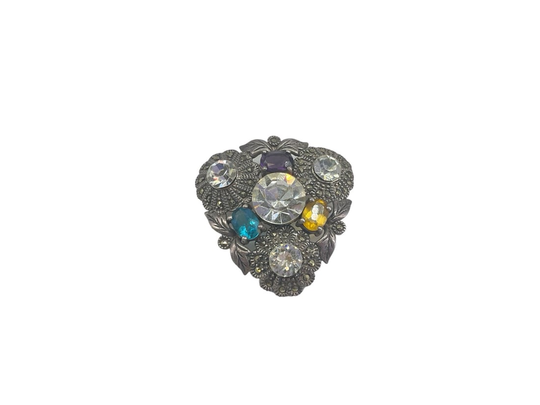 Sterling Silver and Faceted Crystal Pin with Marcasite Stones: Sterling Silver and Faceted Crystal Pin with Marcasite Stones Stamped and tested 925/sterling silver, signed "TH" on reverse, 34.25mm in diameter, 0.40 troy ounces total weight, set with fac