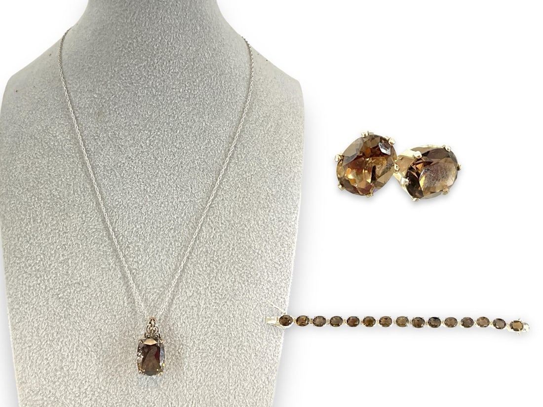 Sterling Silver Jewelry Set with Smoky Topaz Semi-Precious Stones: Sterling Silver Jewelry Set with Smoky Topaz Semi-Precious Stones Stamped and tested 925/sterling silver, 7.5" bracelet, 17" princess length necklace, pierced style earrings on post backings