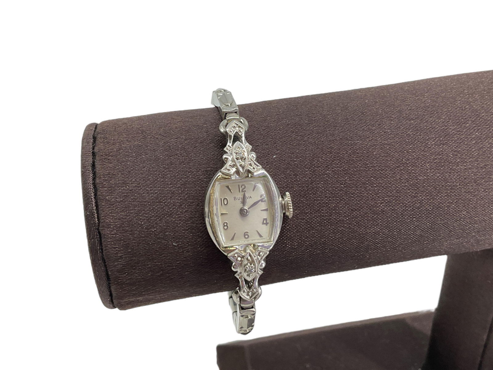 Bulova Vintage Ladies' Wrist Watch: Bulova Vintage Ladies' Wrist WatchYear designation L7, gold-filled case, 23-jewels, 6 adjustments, case set with melee size diamond rounds. Winds, sets and works at the time of listing. 10.5mm dial (o