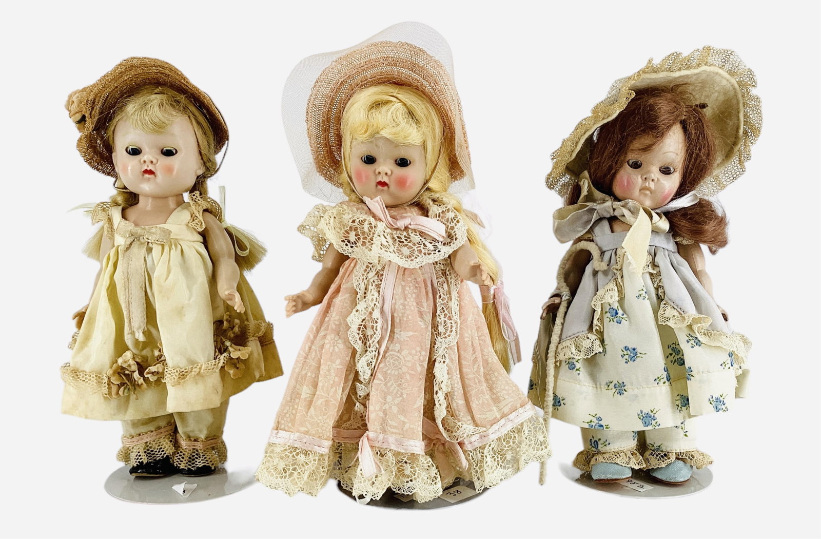 3 Vogue 7-1/2" Hard Plastic Straight Leg Dolls: 3 Vogue 7-1/2" Hard Plastic Straight Leg Dolls Eyes do not close. 1954 My First Corsage #54 Bridesmaid. Blond with braids, pink printed dress with lace & trim, pink panties, beige satin tie shoes & pi