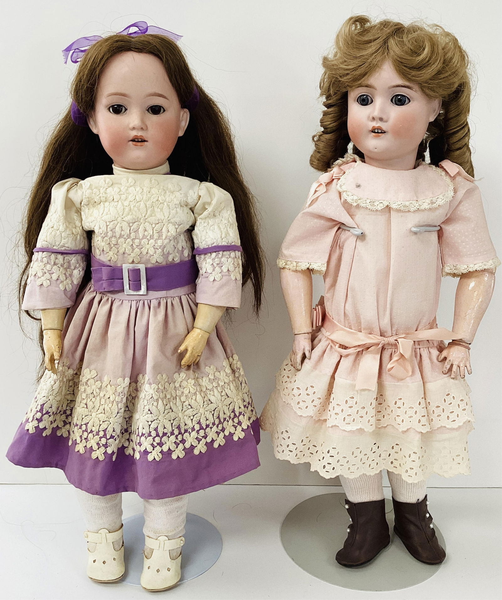 2 Bisque Socket Head on Composition Body Dolls: 2 Bisque Socket Head on Composition Body Dolls22" string jointed composition body, repainted, left pinky finger glued back on. Head marked Germany, G. B. Glue residue on top of head, no cracks or chip