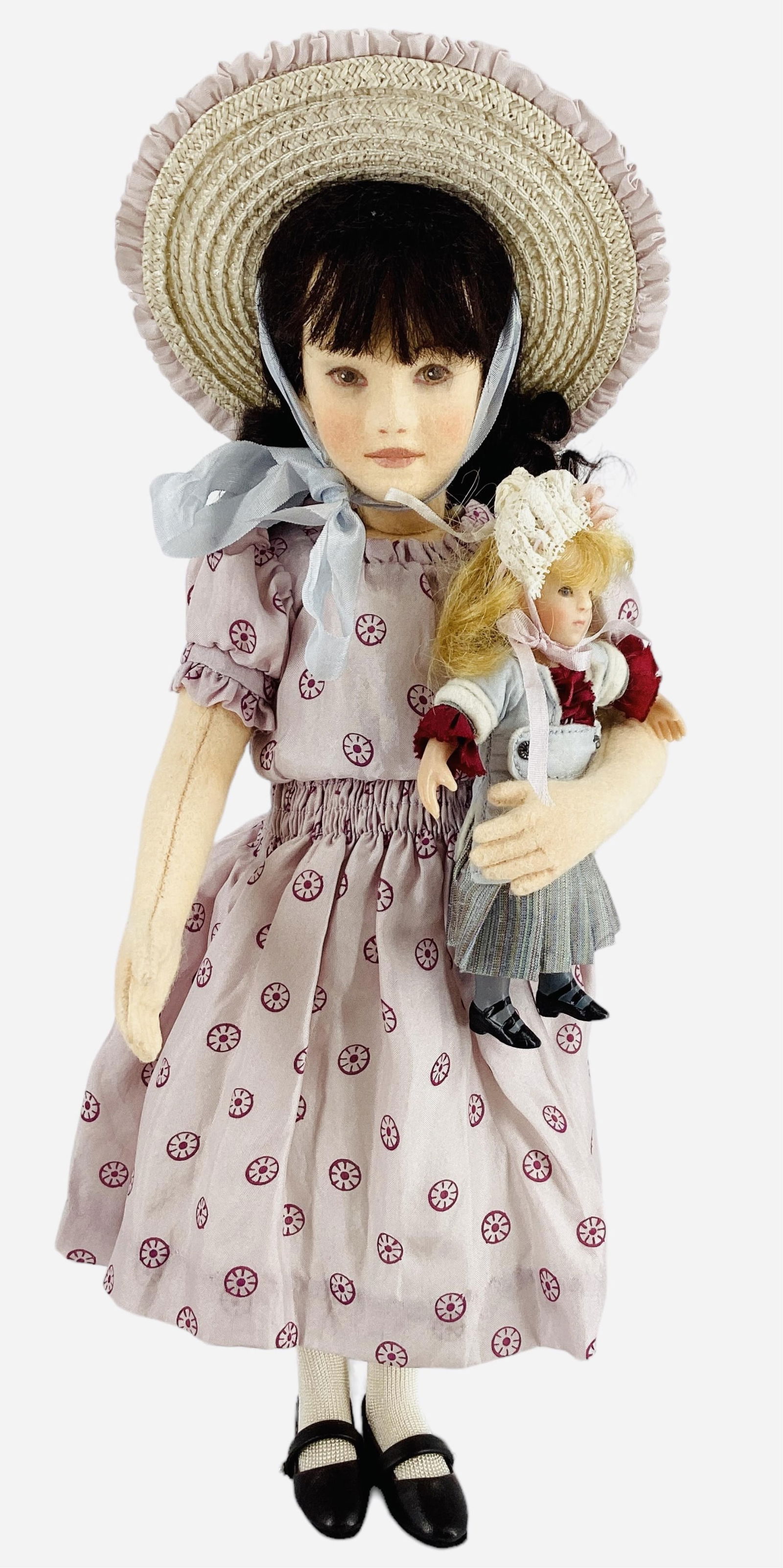 "Genevieve" by R. John Wright.: "Genevieve" by R. John Wright.12" all wool felt doll with mohair wig, molded and painted facial features, on five-piece body. Genevieve comes in her original box with COA and includes her 4