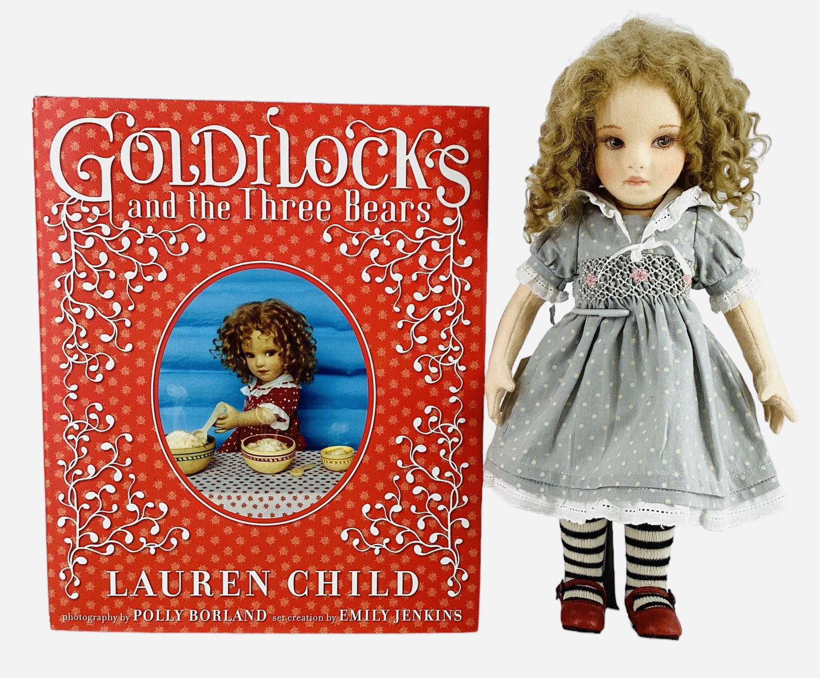 "Goldilocks" by R. John Wright.: "Goldilocks" by R. John Wright.12" wool felt doll with mohair wig, molded and painted facial features, on five-piece body. Goldilocks comes in her original box with COA and basket of fl
