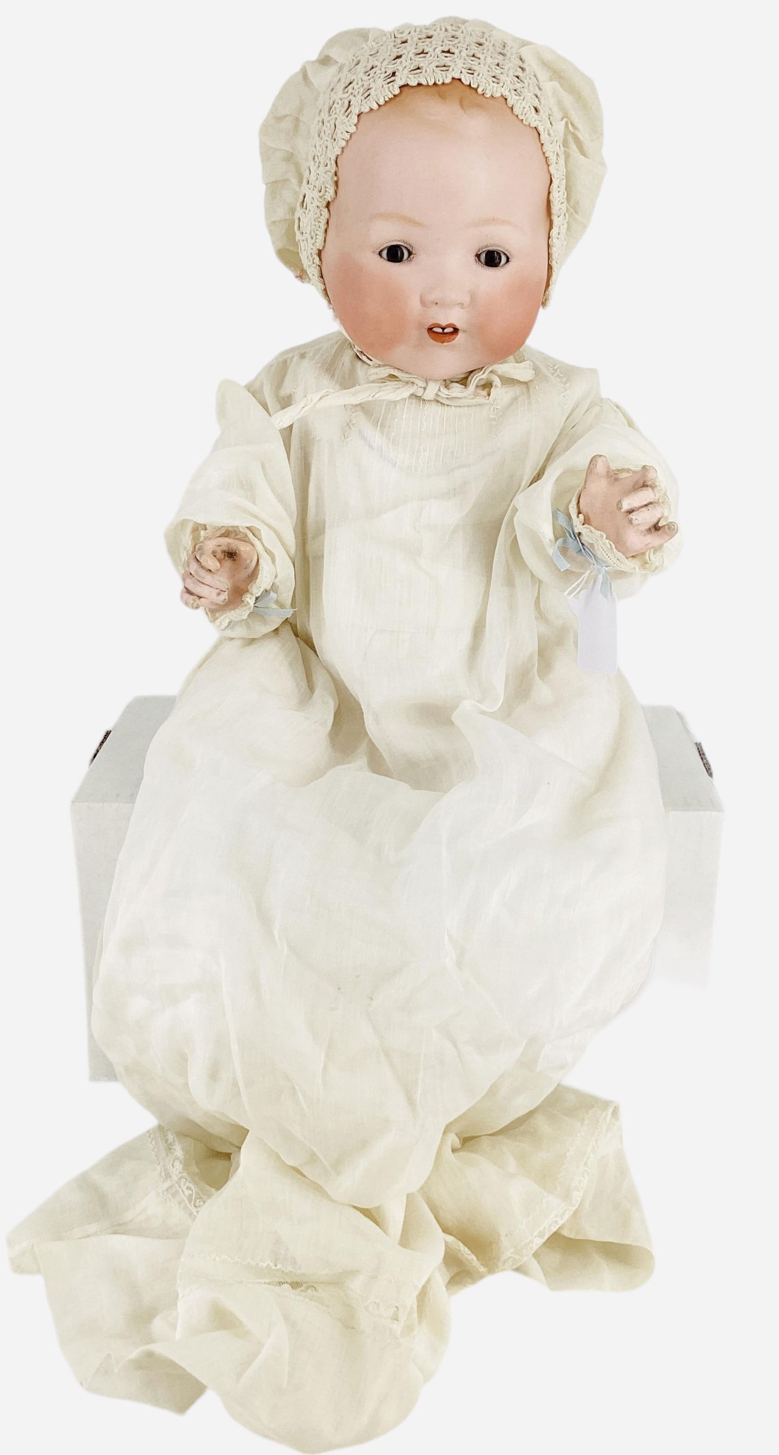 Armand Marseille 20" Bisque Socket Head Dream Baby: Armand Marseille 20" Bisque Socket Head Dream BabyBisque head, composition body, sleep eyes. Molded & painted hair, no chips or cracks, open mouth, 2 lower teeth. Outer muslin dress tagged as Hand Mad
