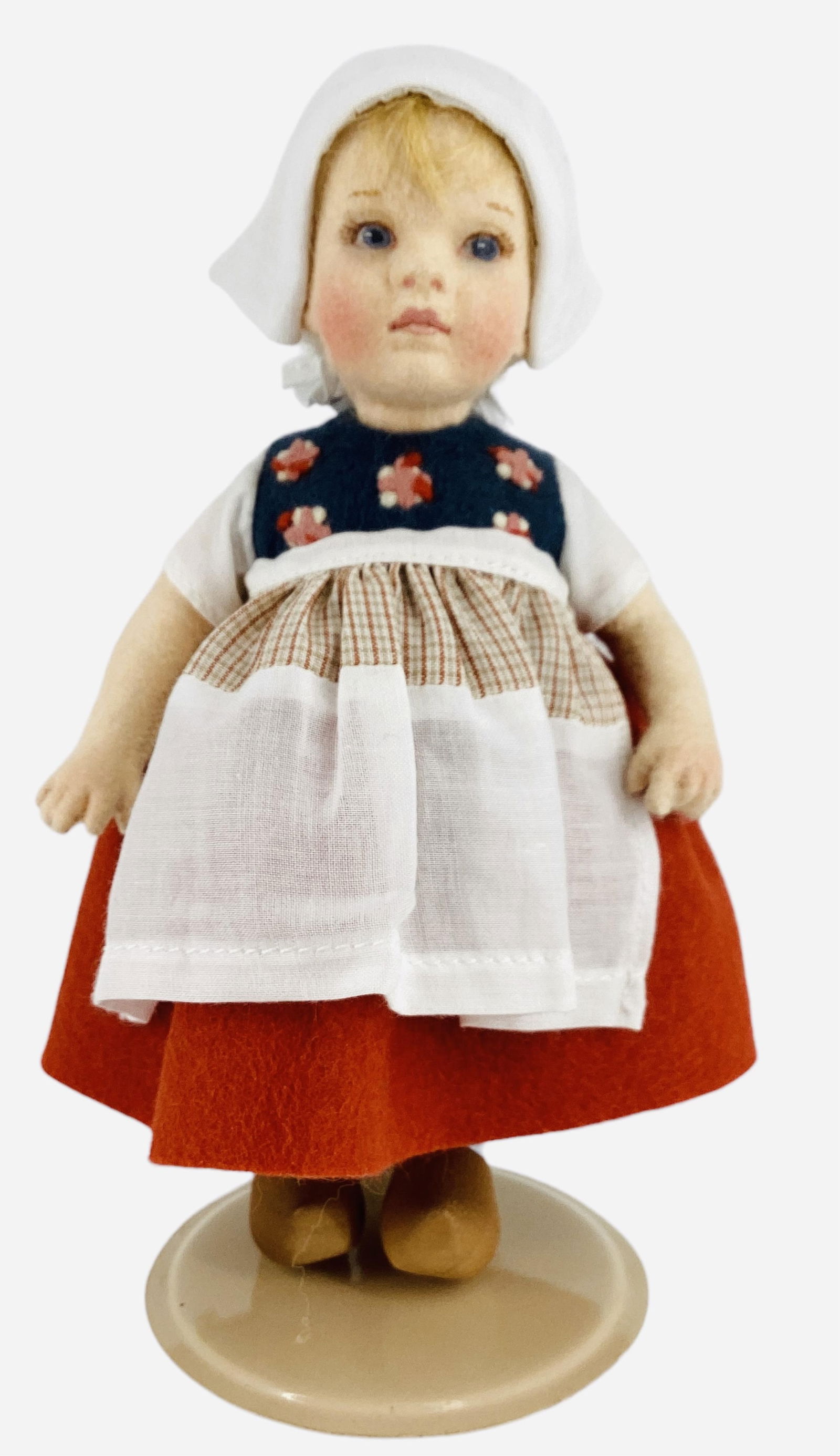 Around the World "Gerta" by R. John Wright.: Around the World "Gerta" by R. John Wright.6 1/2" wool felt doll with mohair wig, molded and painted facial features, on five-piece body, costumed in wool felt with cotton accents and w