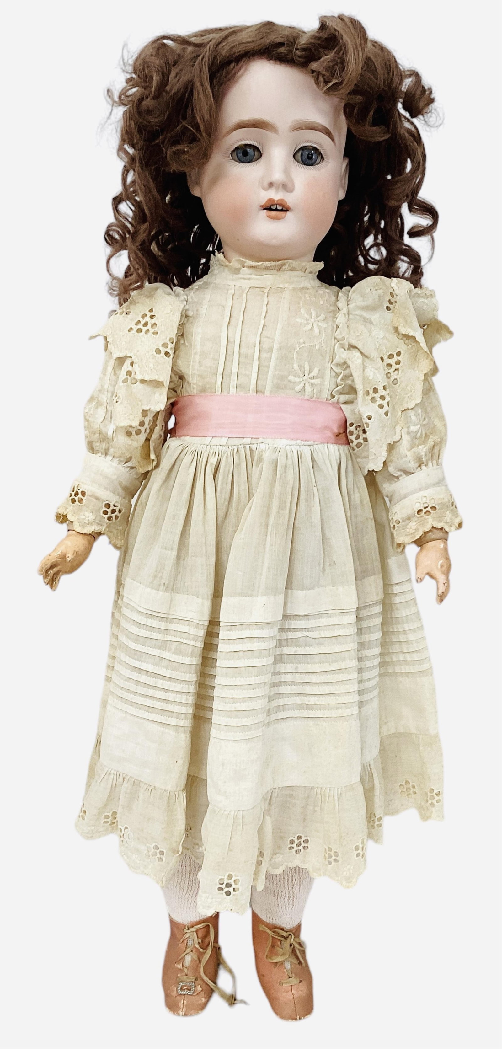 German bisque socket head girl.: German bisque socket head girl.Marked "Germany 63", 24" doll with mohair wig, glass sleep eyes with eyelashes, open mouth with teeth, on jointed composition body. Bisque is good with no