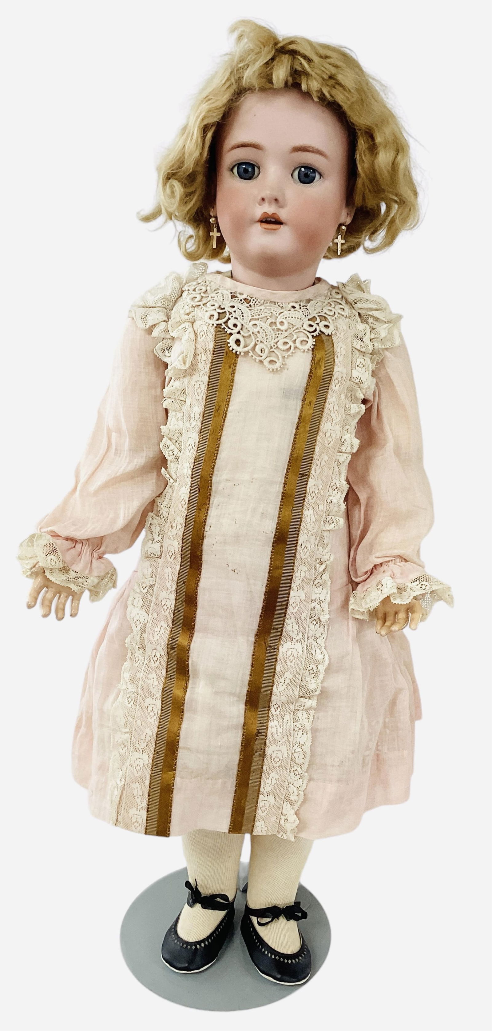 Heinrich Handwerck bisque socket head girl.: Heinrich Handwerck bisque socket head girl.29" doll with mohair wig, glass sleep eyes, molded brows, pierced ears, open mouth with teeth, on jointed composition body. Bisque appears to be good wi