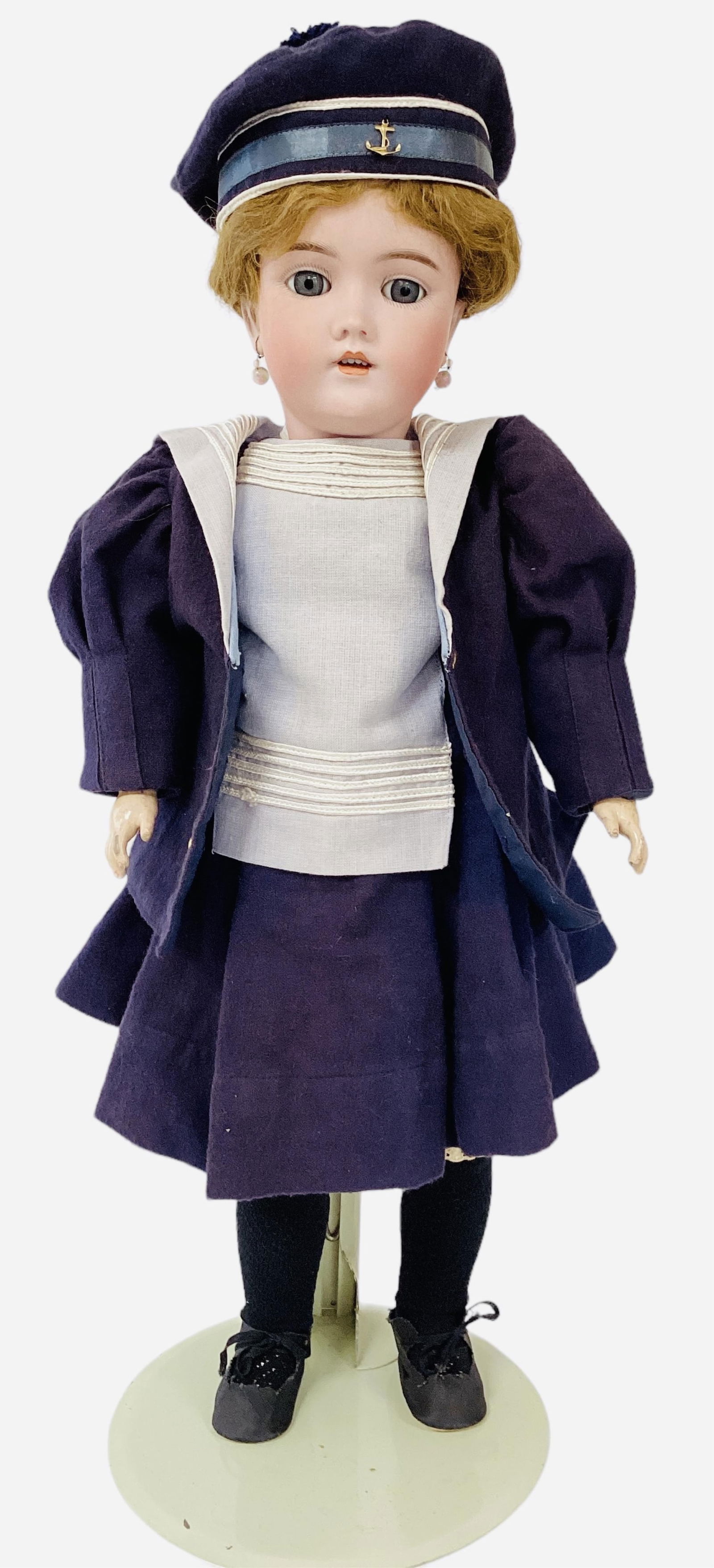 Heinrich Handwerck 99 DEP bisque socket head girl.: Heinrich Handwerck 99 DEP bisque socket head girl.23" doll with original mohair wig, glass sleep eyes, pierced ears, open mouth with teeth, on jointed composition body, redressed. Bisque is good