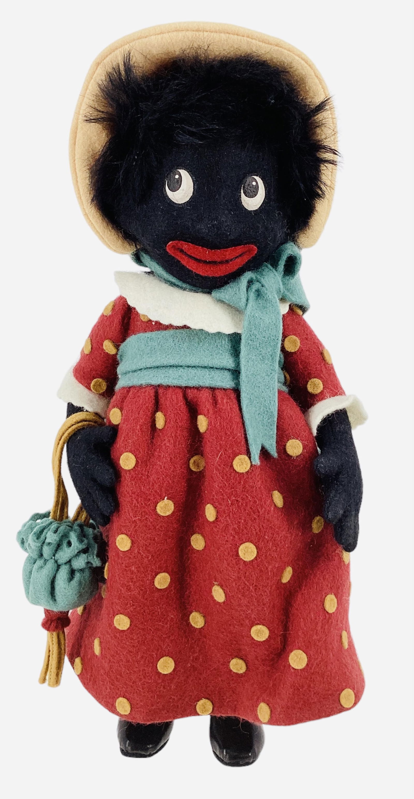 "Miss Golly" by R. John Wright.: "Miss Golly" by R. John Wright.10" all wool felt doll with mohair wig, molded and painted facial features, applied mouth, on five-piece body. Miss Golly comes in her original box with C