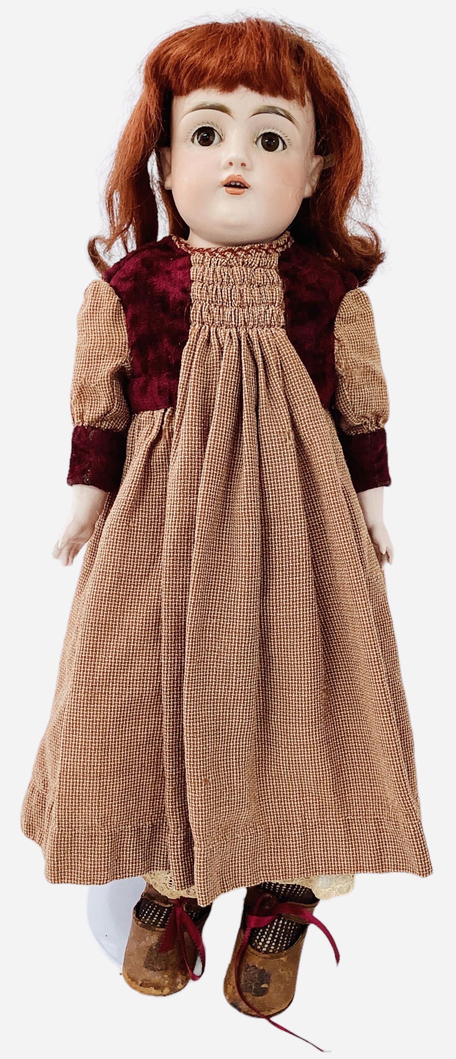 Kestner 154 bisque shoulder head girl.: Kestner 154 bisque shoulder head girl.19" doll with human hair wig over plaster pate, glass sleep eyes, open mouth with teeth, on gusseted kid body with bisque lower arms, cloth lower legs, dress