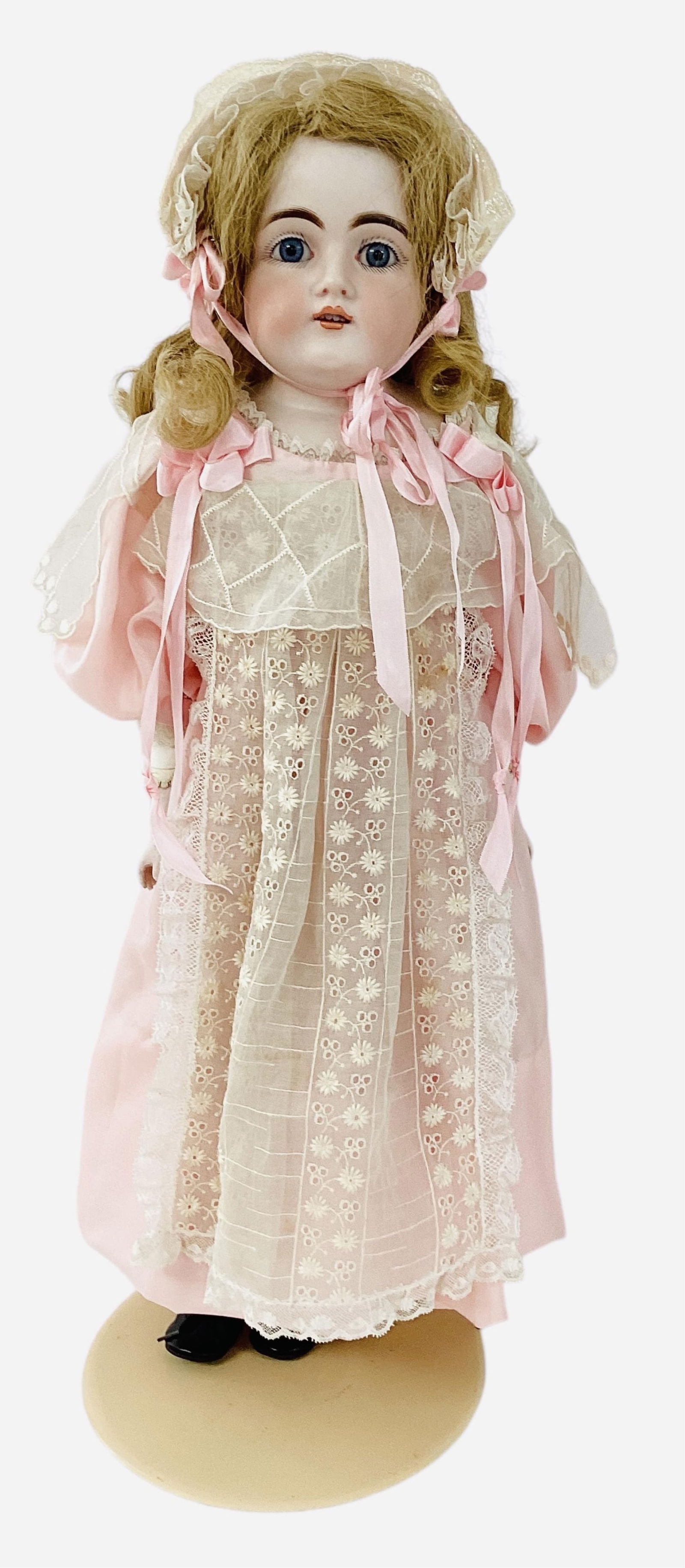 Kestner 154 bisque shoulder head girl.: Kestner 154 bisque shoulder head girl.24" doll with human hair wig, stationary glass eyes, open mouth with teeth, rivet jointed kid body with bisque lower arms. "Par Excellence" label o