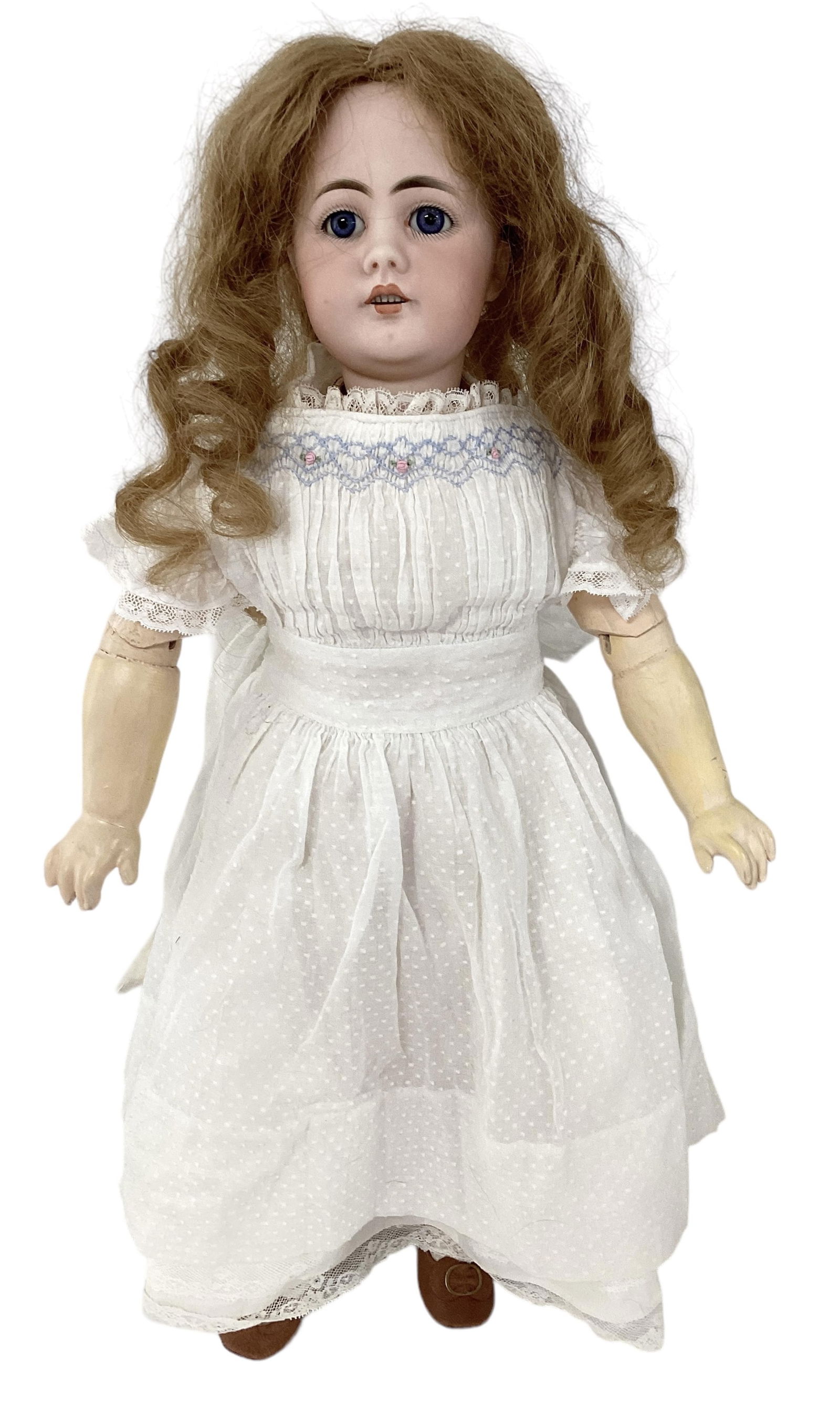 Simon & Halbig 949 bisque socket head girl.: Simon & Halbig 949 bisque socket head girl.23" doll with human hair wig, glass sleep eyes, pierced ears, open mouth with teeth, jointed composition and wood body with straight wrists. Bisque is c