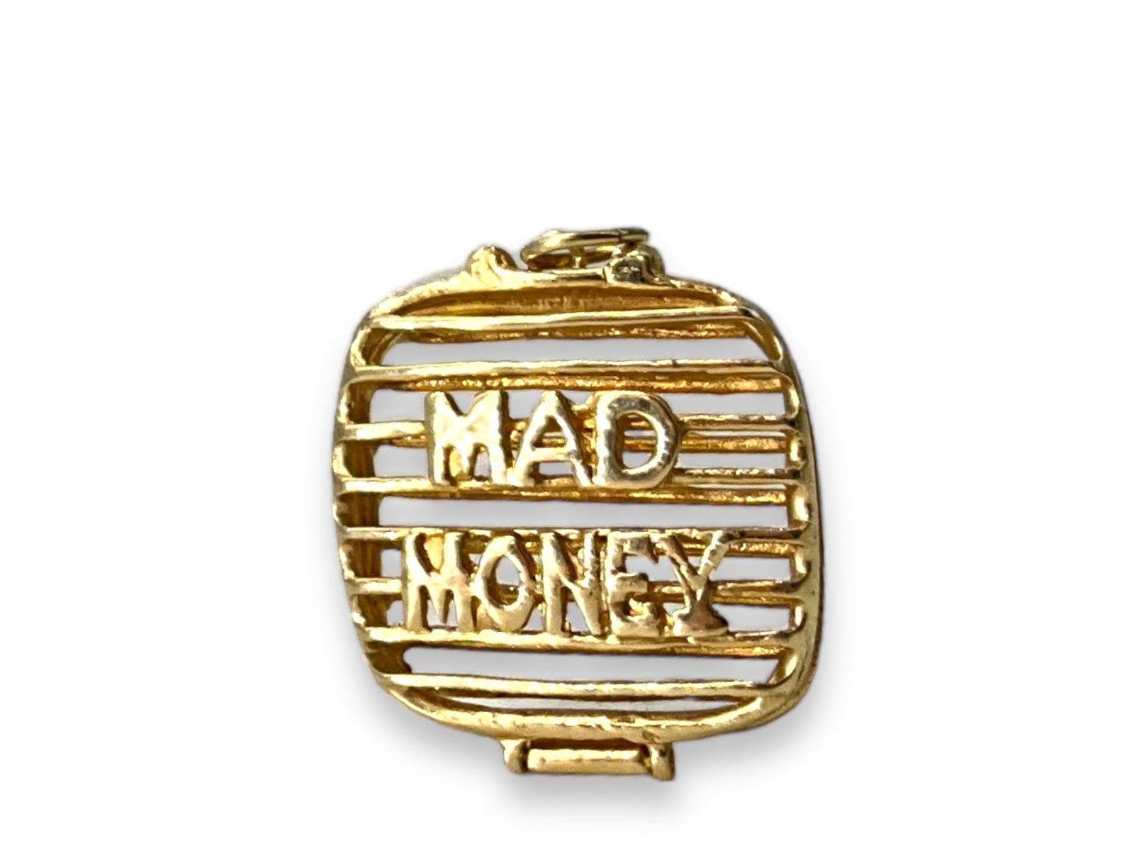 Vintage 14kt Yellow Gold "Mad Money" Pendant: Vintage 14kt Yellow Gold "Mad Money" Pendant Cage pendant perfect for storing a bill or coin measuring (24.3mmx. 21.3mm) - not including jump ring, with hinged closure, stamped and tested (4.9 grams t