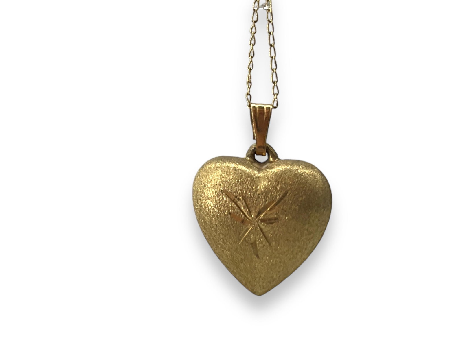 14kt Yellow Gold Necklace and Heart Pendant: 14kt Yellow Gold Necklace and Heart Pendant 14kt yellow gold necklace and pendant (stamped and tested), 2.0 grams total weight, 16" choker length necklace (thin chain), featuring a 14.75mm heart-
