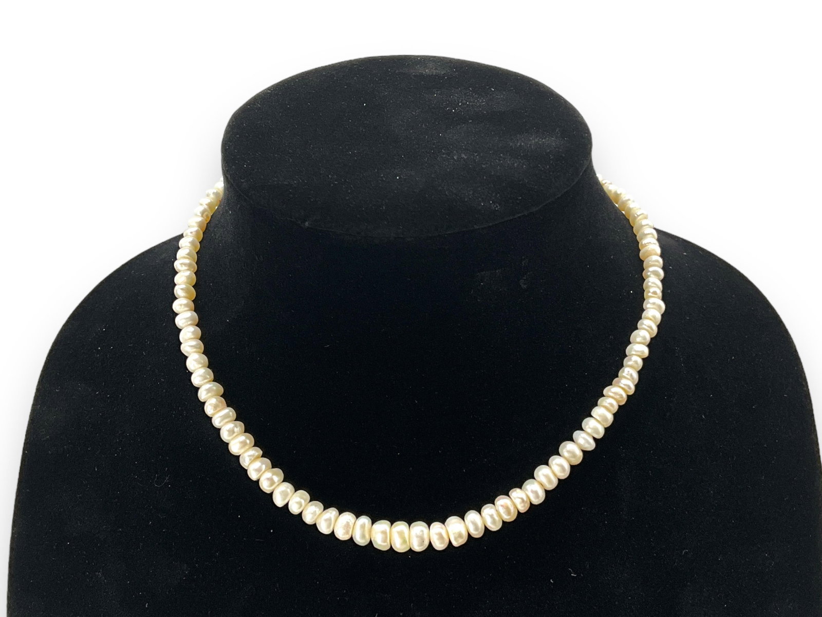 Cultured Pearl Necklace: Cultured Pearl Necklace Base metal clasp, 15.25" choker length, pearls measuring up to 7.25mm in size. Pearls have semi-oval shapes and have great luster and good nacre quality.