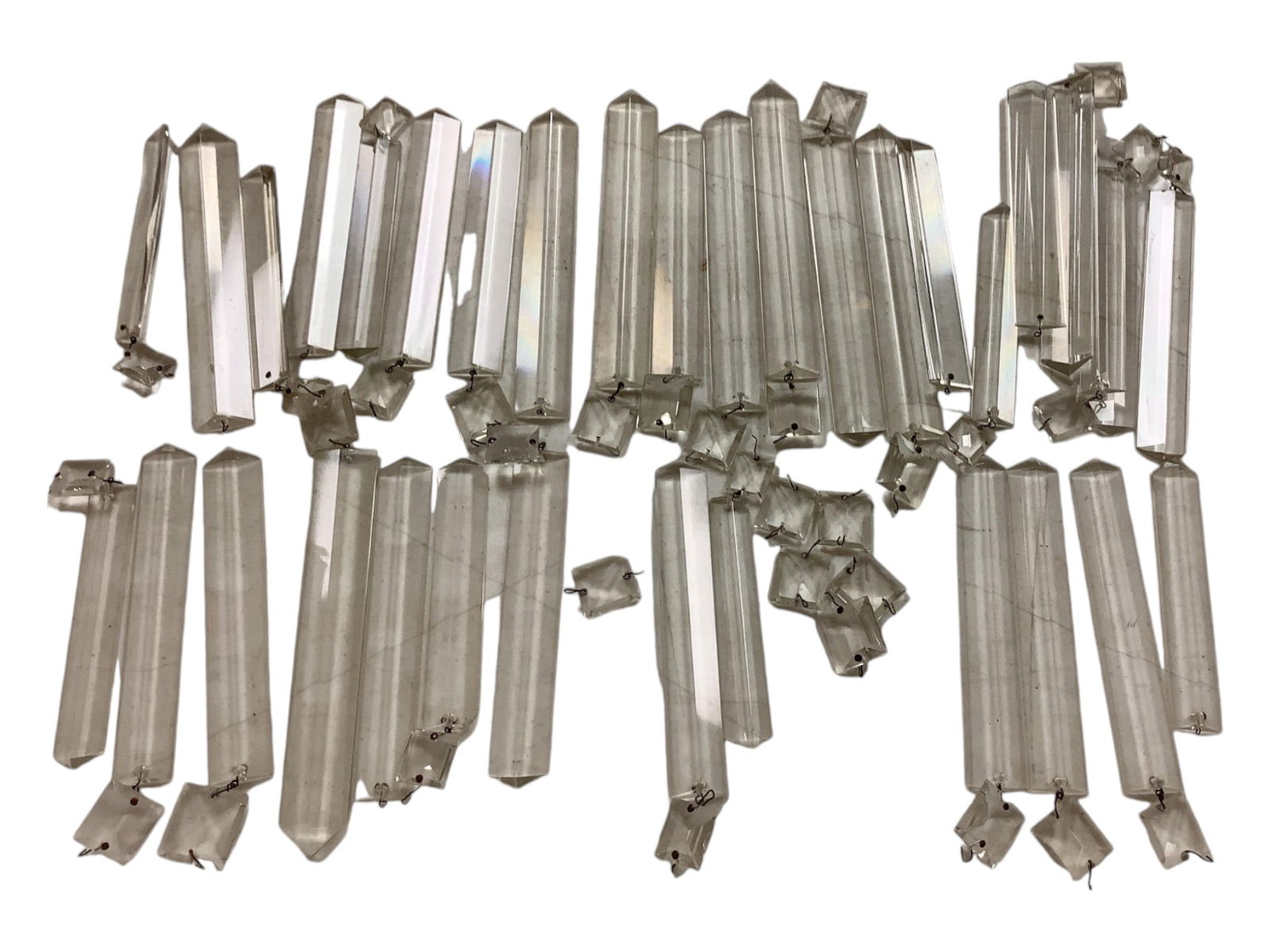Vintage Chandelier Glass Prisms: Vintage Chandelier Glass Prisms(34) three sided prisms with 1" square connectors. 5 with chips on prism or connector. Sizes range from 5" to 7".