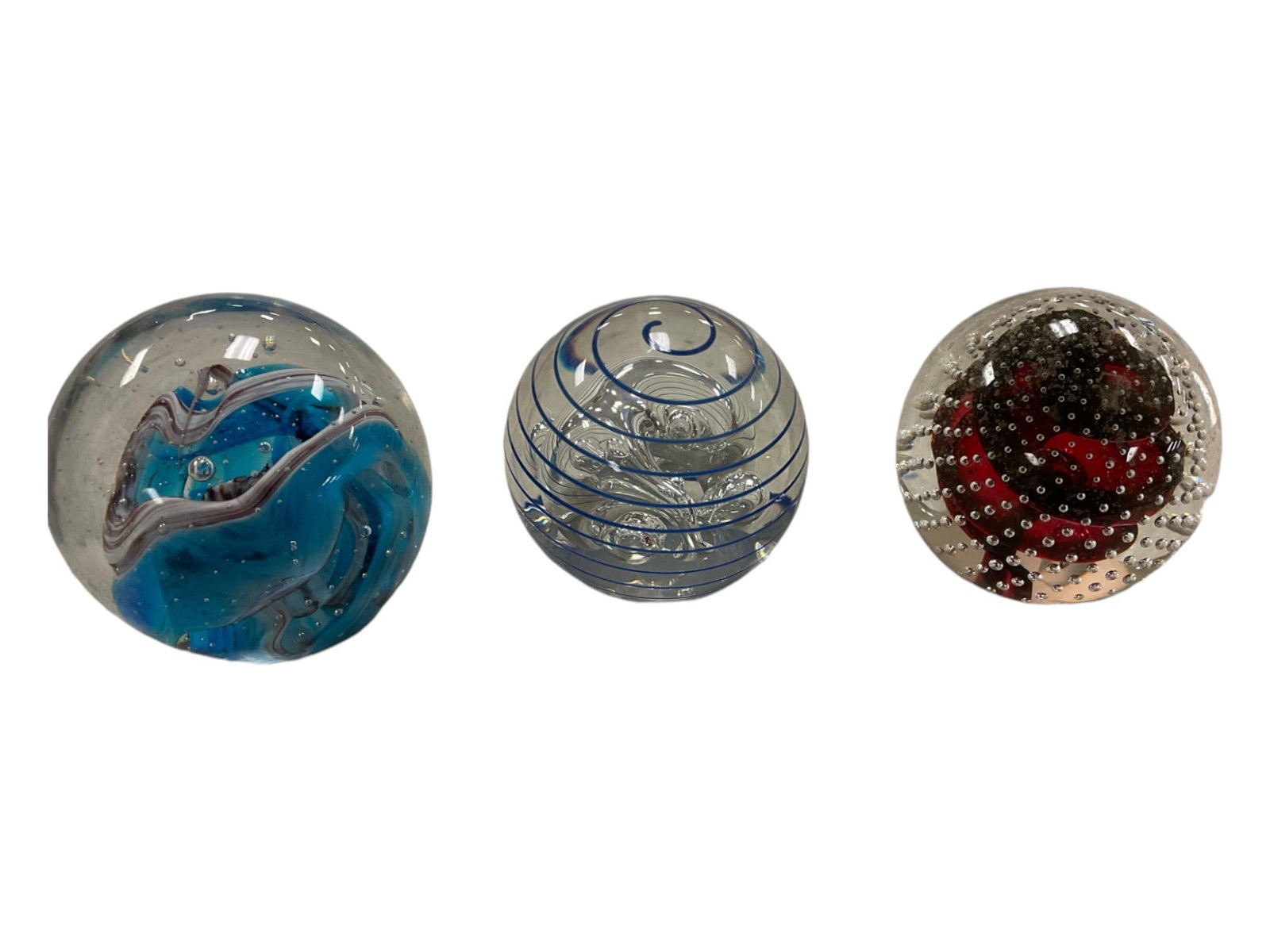 (3) Glass Paperweights.: (3) Glass Paperweights.Not signed.
