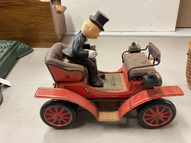 Vintage Battery Operated Car and a Basket of Machine Marbles