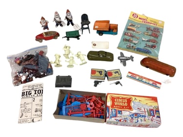 A Mixture of Metal, Plastic & China Toys