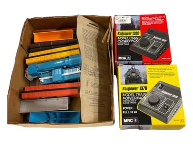 Lot of 8 Plastic Train Cars and (2) Rail power Powerpacks.