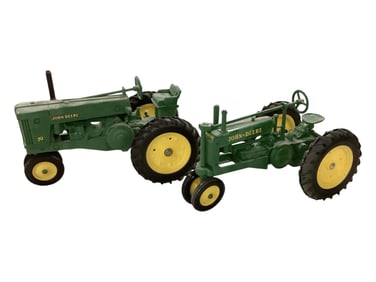 Two ERTL Die Cast John Deere Steerable Tractors.