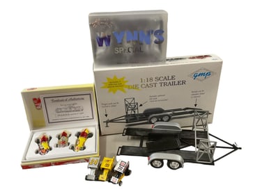 (3) Wynns Friction 1:43 scale die cast.(3) Raceing Champions Aero. (1) Die Cast Trailer.