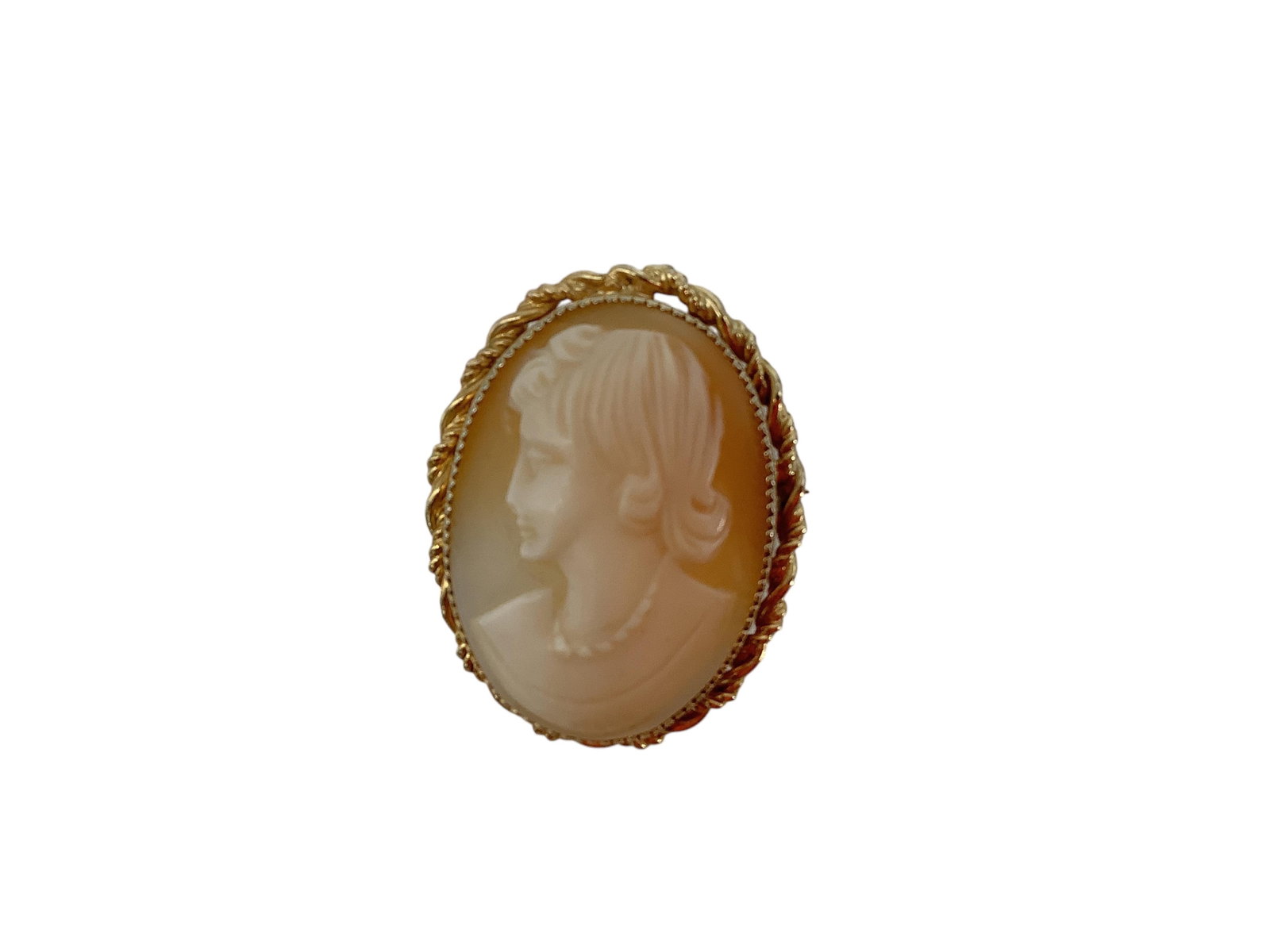 Shell Cameo Pin of Modern Woman: Shell Cameo Pin of Modern Woman This carved shell cameo of a lady in modern dress has a marked and tested gold-filled frame, the piece is approx 1 1/4" tall and weighs 5.34 grams.