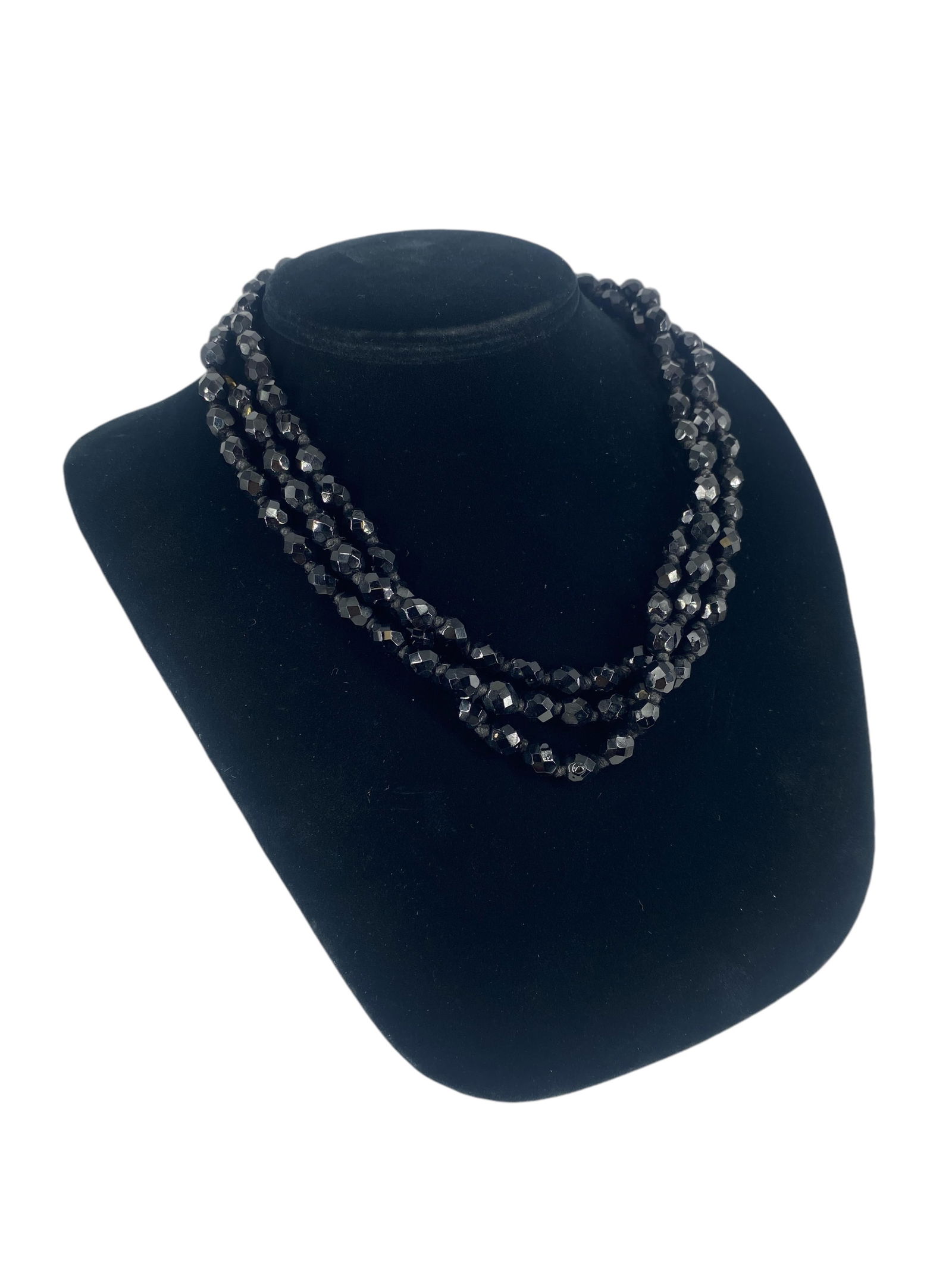 Jet Necklace: Jet NecklaceScrew-clasp closure, double-knotted strand, jet beads approximately 7.5mm in diameter, 52" rope length, antique - vintage age.