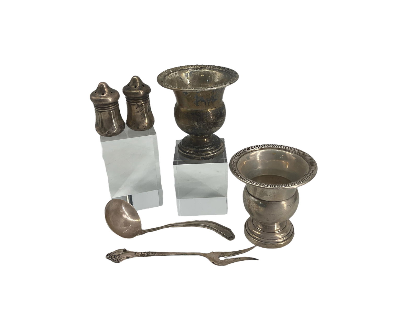 Sterling Silver Housewares & Accessories: Sterling Silver Housewares & AccessoriesTwo sterling silver egg cups measuring 2.75" in height, sterling silver lemon fork and gravy ladle, pair of small 1.75" salt and pepper shakers with a