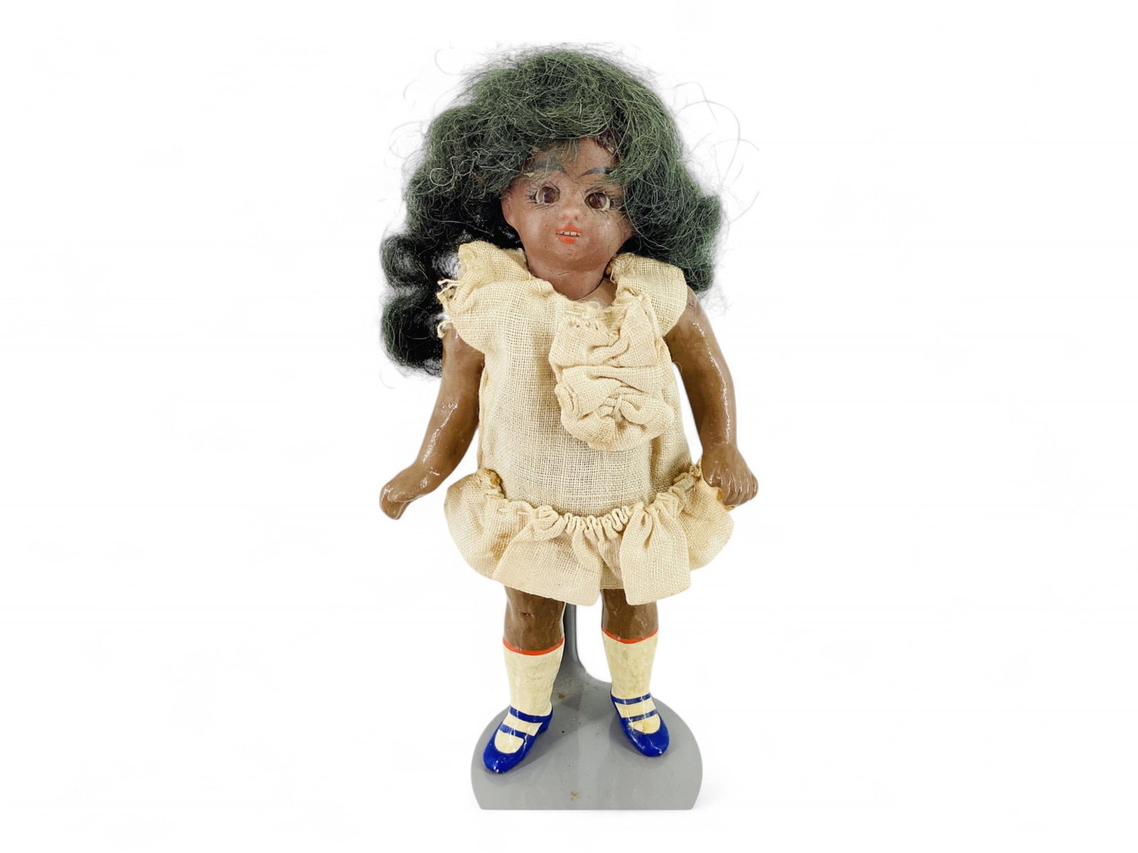 Doll House size German bisque socket head child.: Doll House size German bisque socket head child. 4 3/4" dark complexioned girl with mohair wig, stationary glass eyes, open mouth with teeth, five-piece painted composition peg-jointed body with 