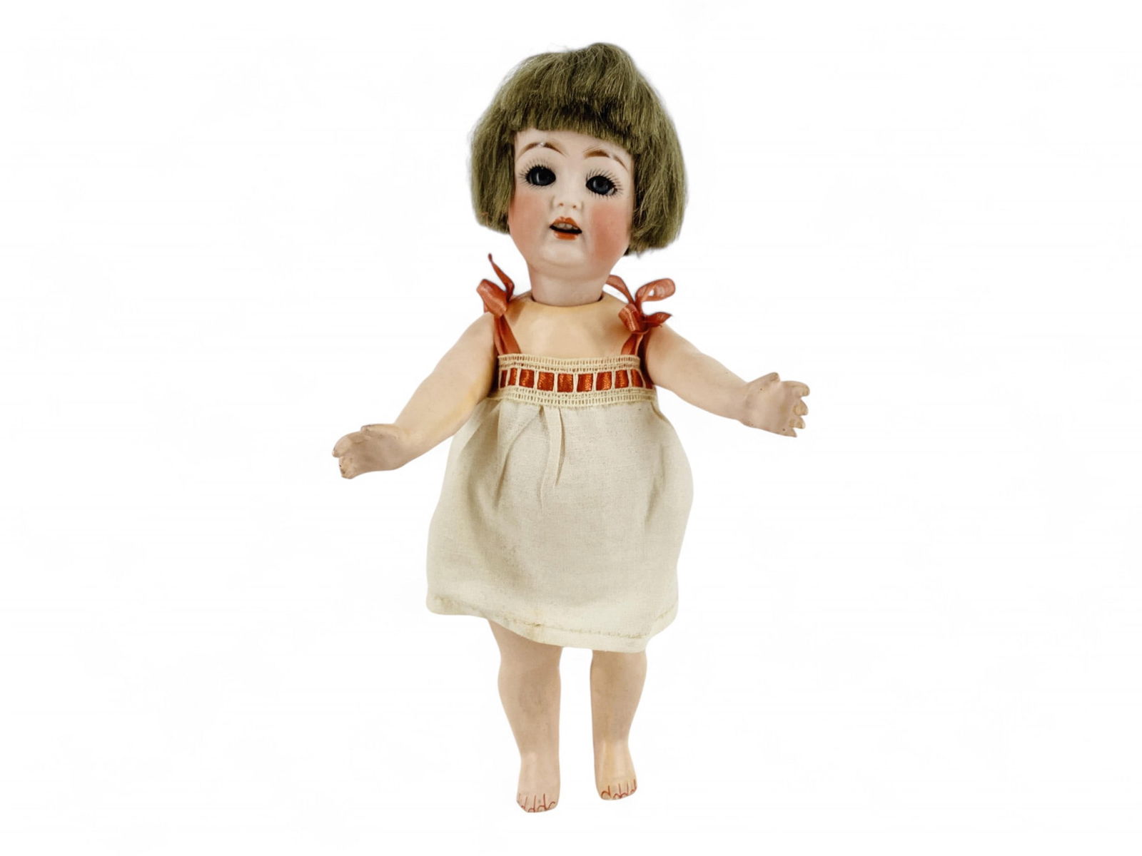Kestner J.D.K. 260 bisque socket head toddler.: Kestner J.D.K. 260 bisque socket head toddler.8 3/4" doll with original mohair wig, glass sleep eyes, open mouth with teeth, on heavy five-piece composition toddler body. Bisque is good with no d