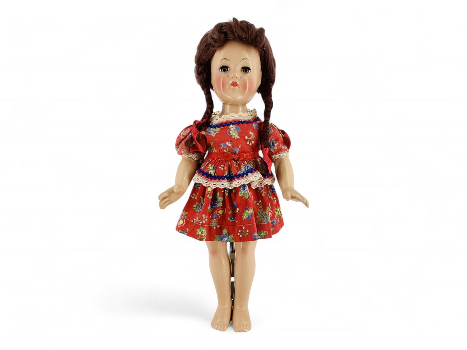 Vintage Effanbee Girl.: Vintage Effanbee Girl.17 1/2" composition doll with mohair wig in original set, sleep eyes with eyelashes, closed mouth, five-piece body, wears red floral print dress with attached panty, no shoe