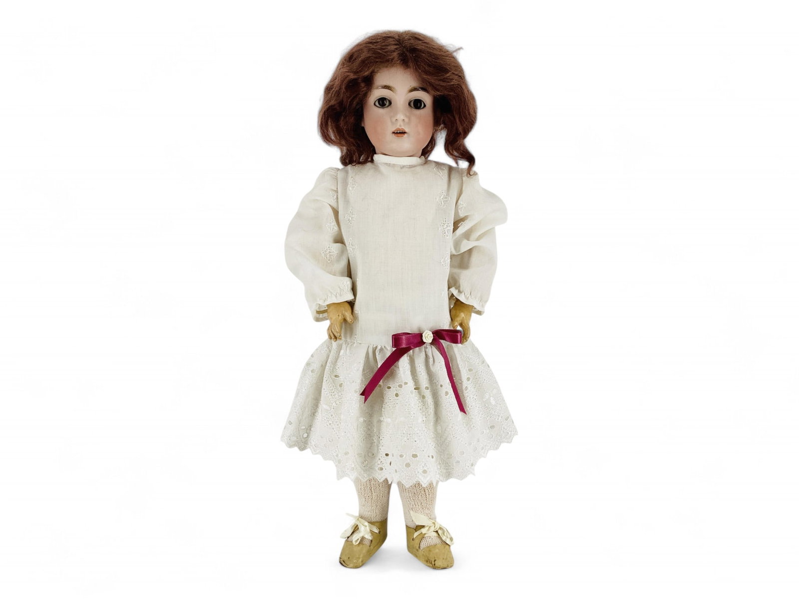Kestner 167 bisque socket head girl.: Kestner 167 bisque socket head girl. 17" doll with mohair wig over intact plaster pate, glass sleep eyes, closed mouth with teeth, on jointed composition body, redressed. Bisque is good with no a