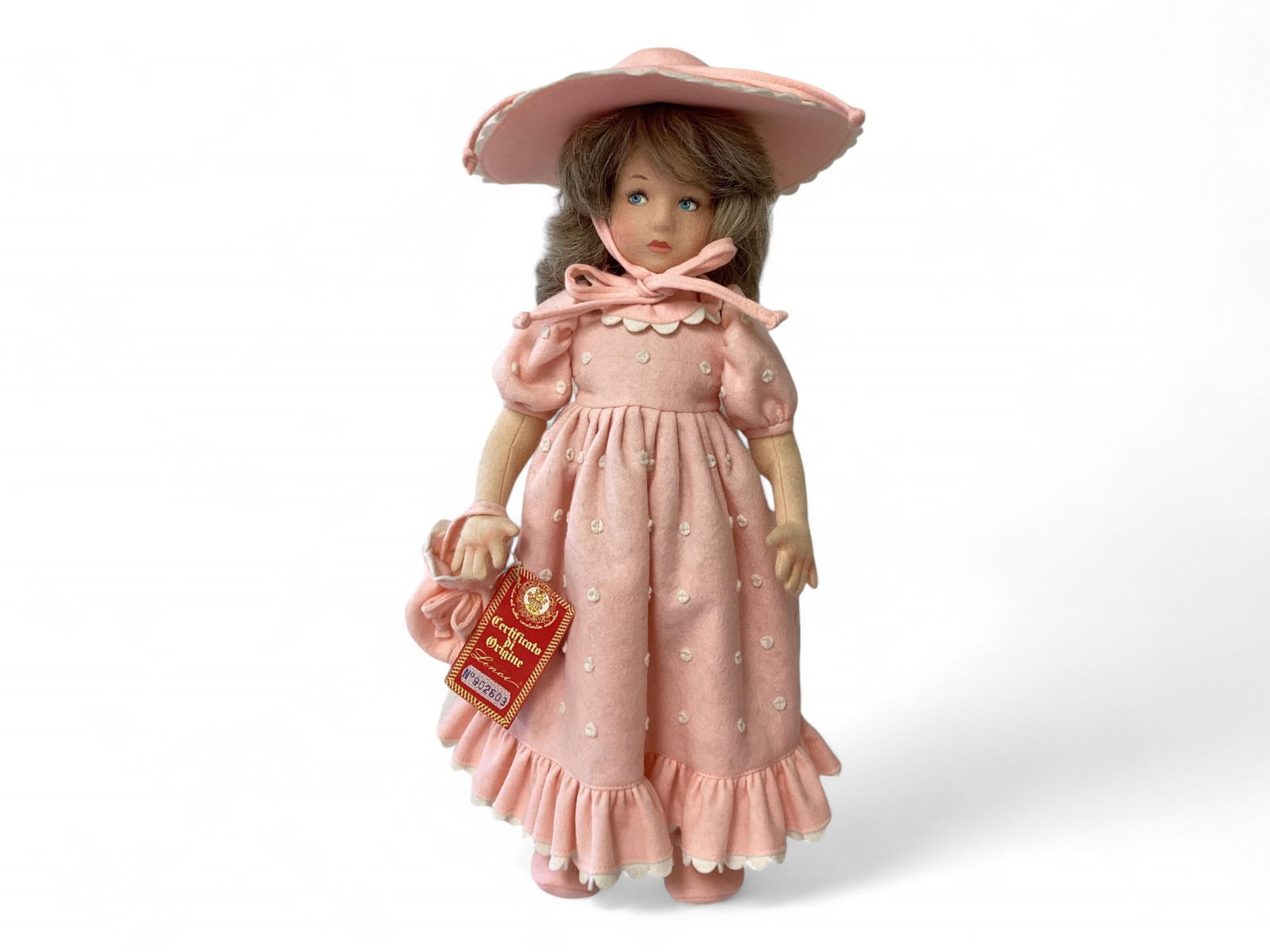 Lenci 17" Elisabetta: Lenci 17" ElisabettaWool felt doll with human hair wig, molded and painted facial features, on five-piece body with tab jointed arms and disk jointed legs. Elisabetta wears a tagged pink wool felt gow
