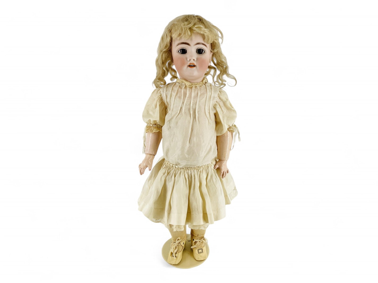 Heinrich Handwerck 109 bisque socket head child.: Heinrich Handwerck 109 bisque socket head child. 20" doll with antique mohair wig, glass sleep eyes, pierced ears, open mouth with teeth, on jointed composition body. Bisque is good with no damag